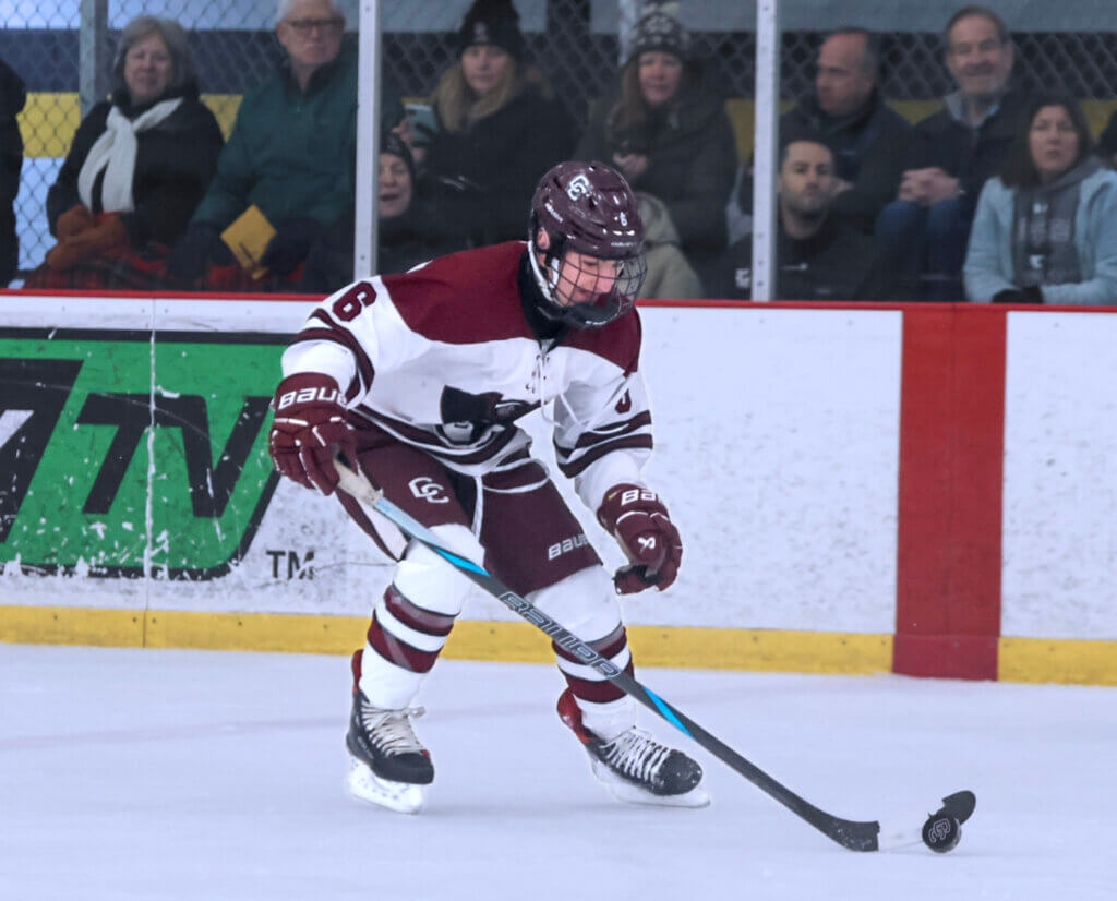 Junior Joe Grasso grabs the puck in the perfect spot. Photo by Leslie Bailey