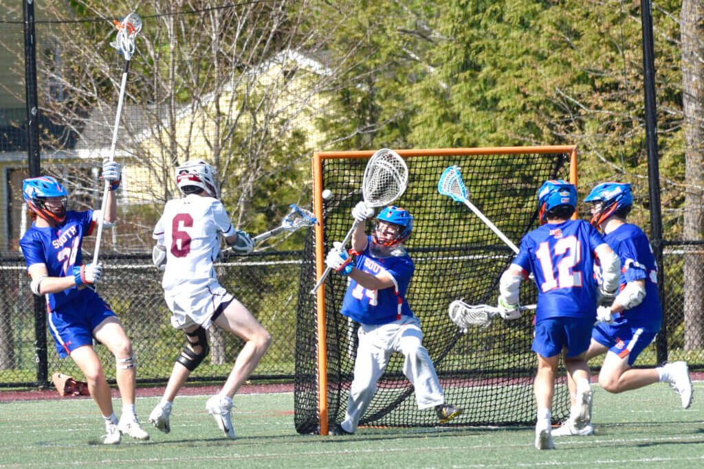 Tyler Shepard scores. Photo by Cris Van Dyke.