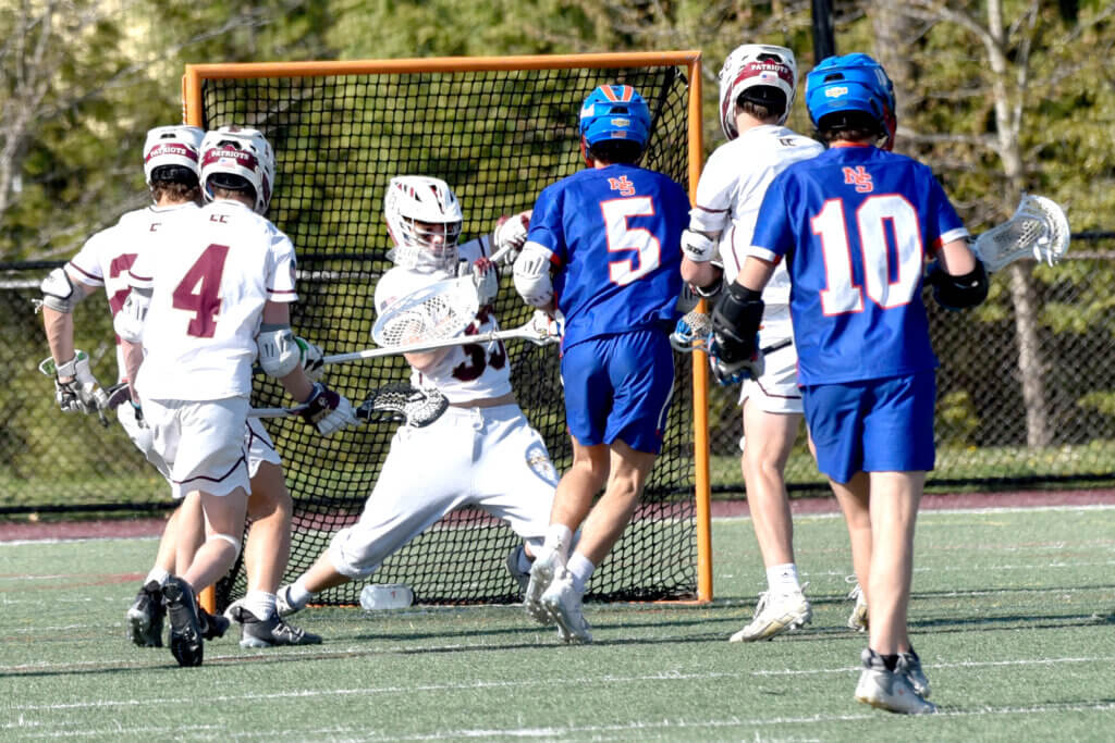 Goalie Ben Wonsek makes a save. Photo by Cris Van Dyke.