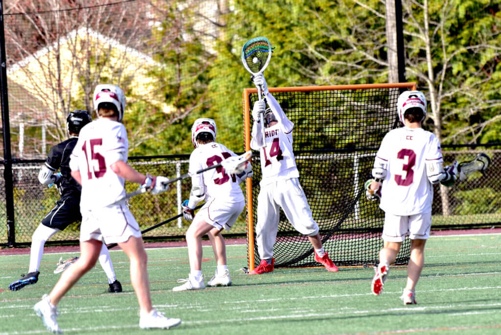 Jake Huff goes for the save. Photo by Cris Van Dyke