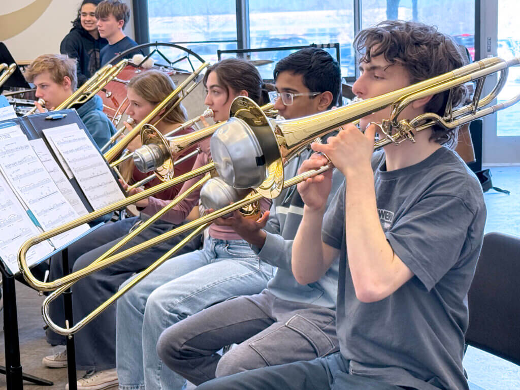 A row of trombonists at a CCHS Concert Band rehearsal. Photo: Laurie O’Neill/The Acton Bridge