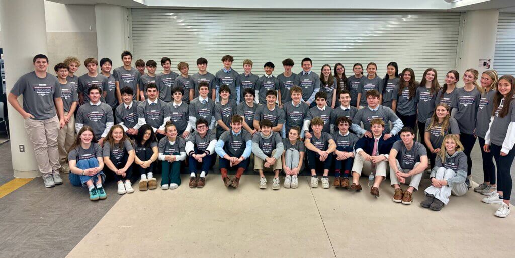 The Acton-Carlisle hockey teams (boys and girls varsity and boys JV) gathered for a dinner on December 12, the eve of the Warriors 4 Warriors | Patriots 4 Patriots games against Lincoln-Sudbury. The annual event honors Scott Milley and his family and supports military personnel and their families through the 1st Lt. Scott F. Milley Memorial Foundation. Photo by Jennifer Kamionek