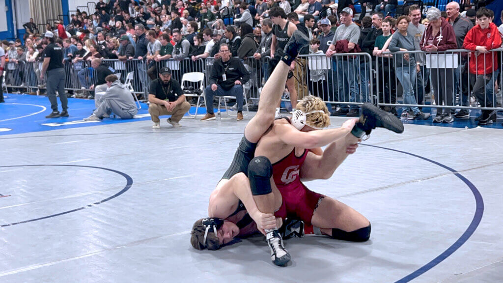 Eddie Myles scrambles his way to a pin. Photo by Tamara Myles