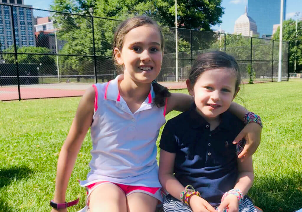 Valentina with her sister, Micaela, at a court in Boston Common where they learned how to play. Courtesy of Abby Nein