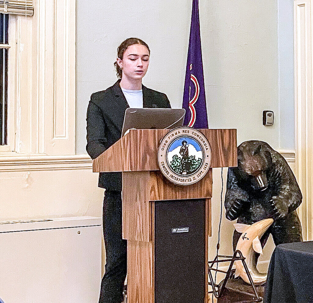 Acton-Carlisle High School Sunrise Club President Iliana Benson presents her group’s planned Town Meeting article to the Select Board. Photo: Dakota Antelman/The Acton Bridge