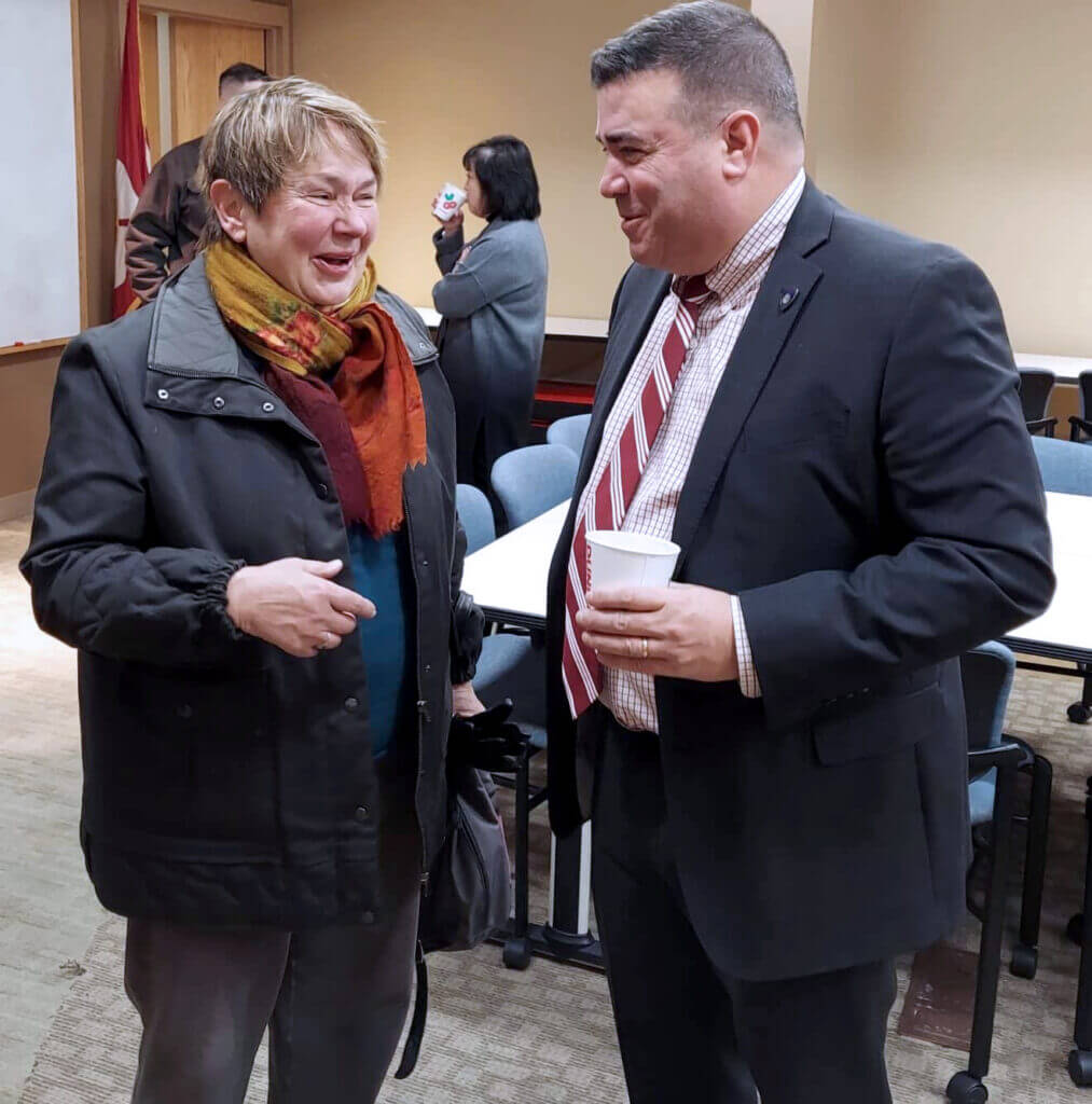 Select Board Member Mary Hartman speaks with Chief Joseph O'Connor. (Photo Courtesy Acton Police Department)