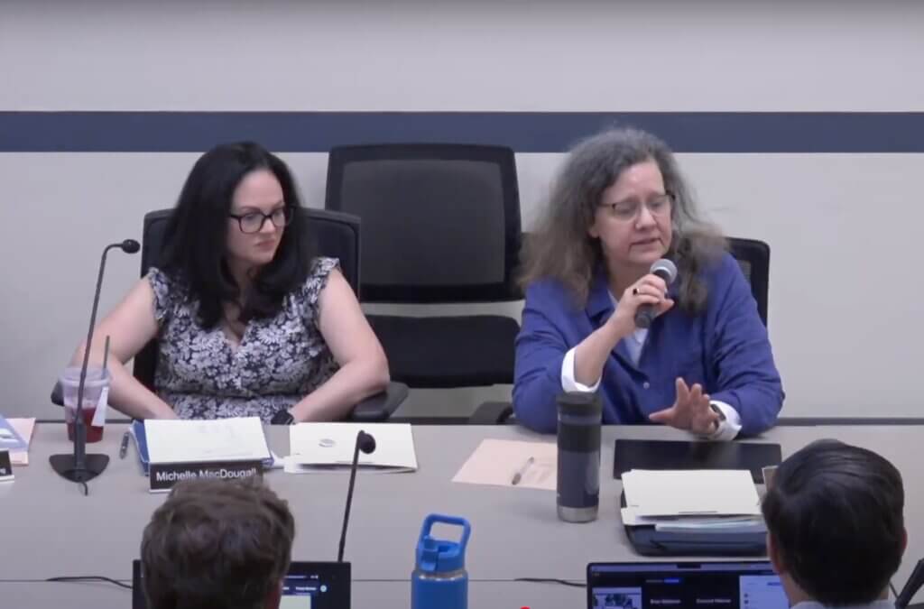 Former School Committee member Cynthia Rainey, right, speaks at an April 30 meeting. Image via Minuteman Media Network