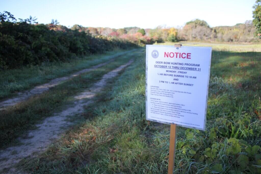 A sign notifies visitors to Acton’s Kaveski Field conservation land about the town’s bowhunting program. Photo: Dakota Antelman/The Acton Bridge