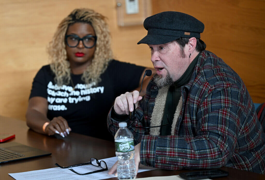 Acton historian Richard Smith, right, speaks as Nikki Turpin, president of The Robbins House looks on, during an interpretive program on civil disobedience in commemoration of Martin Luther King Day at the Walden Pond Visitor Center on Monday, January 20, 2025. Ken McGagh/The Acton Bridge