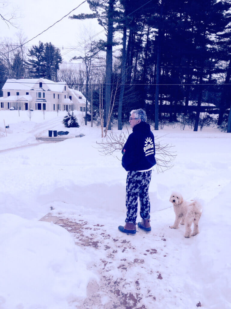 Ken Anderson and dog in snow