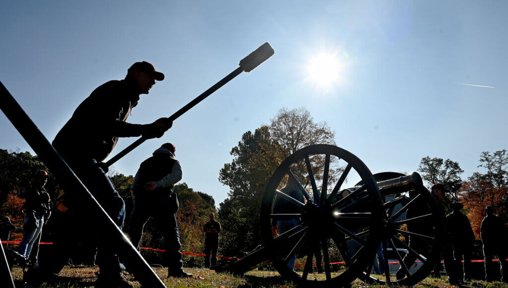 Rammer Sandy Smith, a third-generation Acton Independent Battery member,  takes his position during a dry fire, a practice firing of the cannon without a charge, during Saturday’s  Open Practice and Test Fire at the Old Manse Field.  Smith’s son Trip Smith is a fourt-generation member of the group.  Ken McGagh/The Acton Bridge