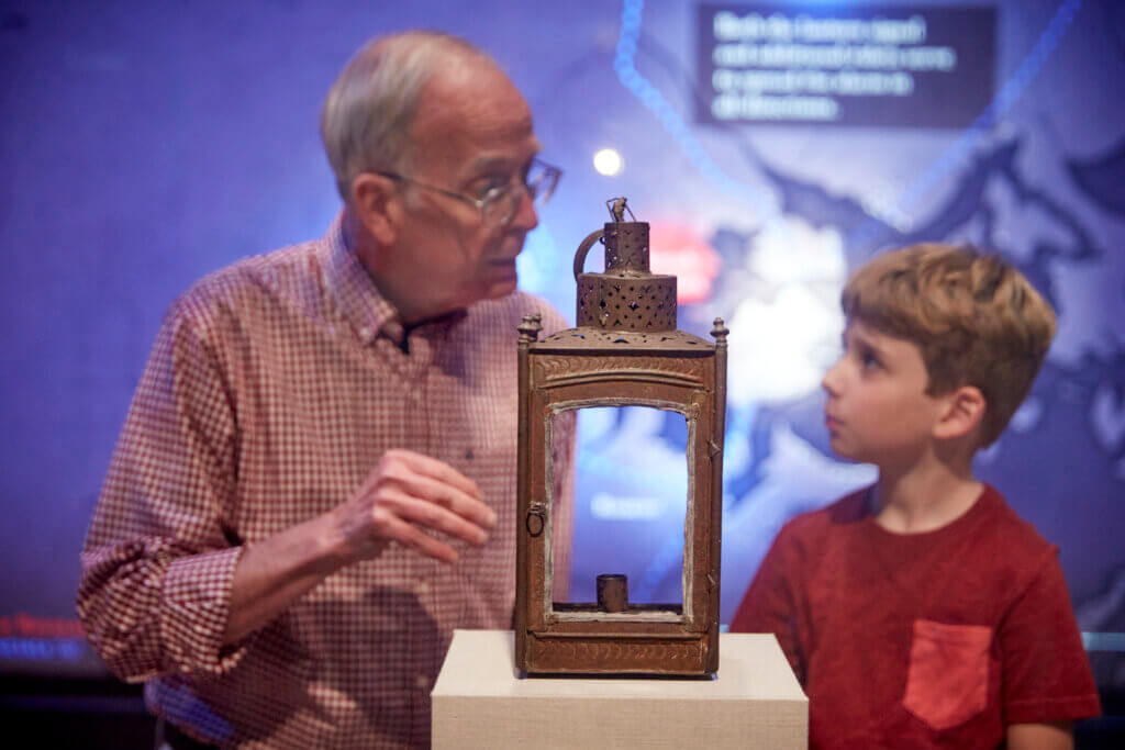 Curator David Wood shares the story behind the legendary lantern from Paul Revere’s midnight ride. Photo courtesy of the Acton Museum