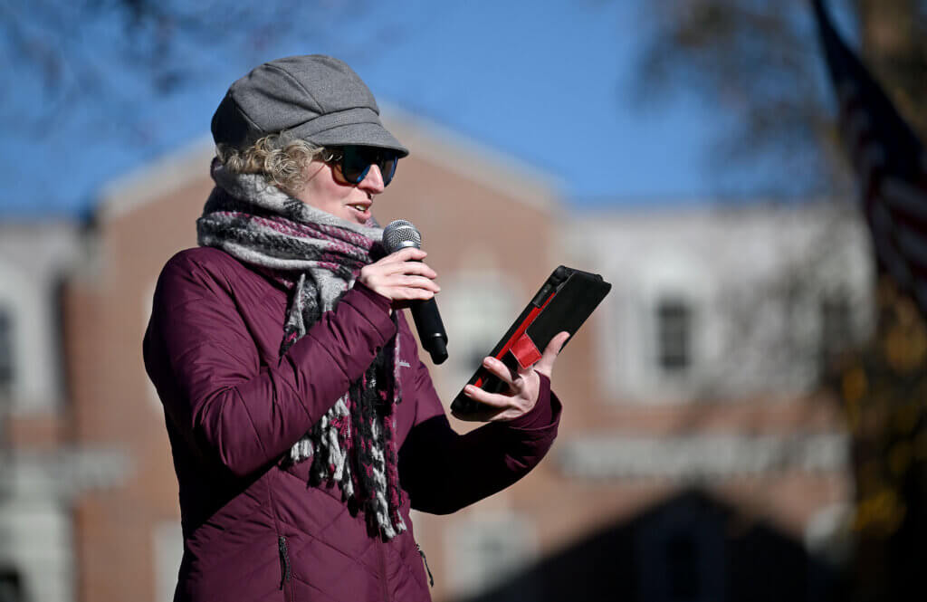Acton historian Beth van Duzer offers remarks during the rededication. Photo: Ken McGagh/The Acton Bridge