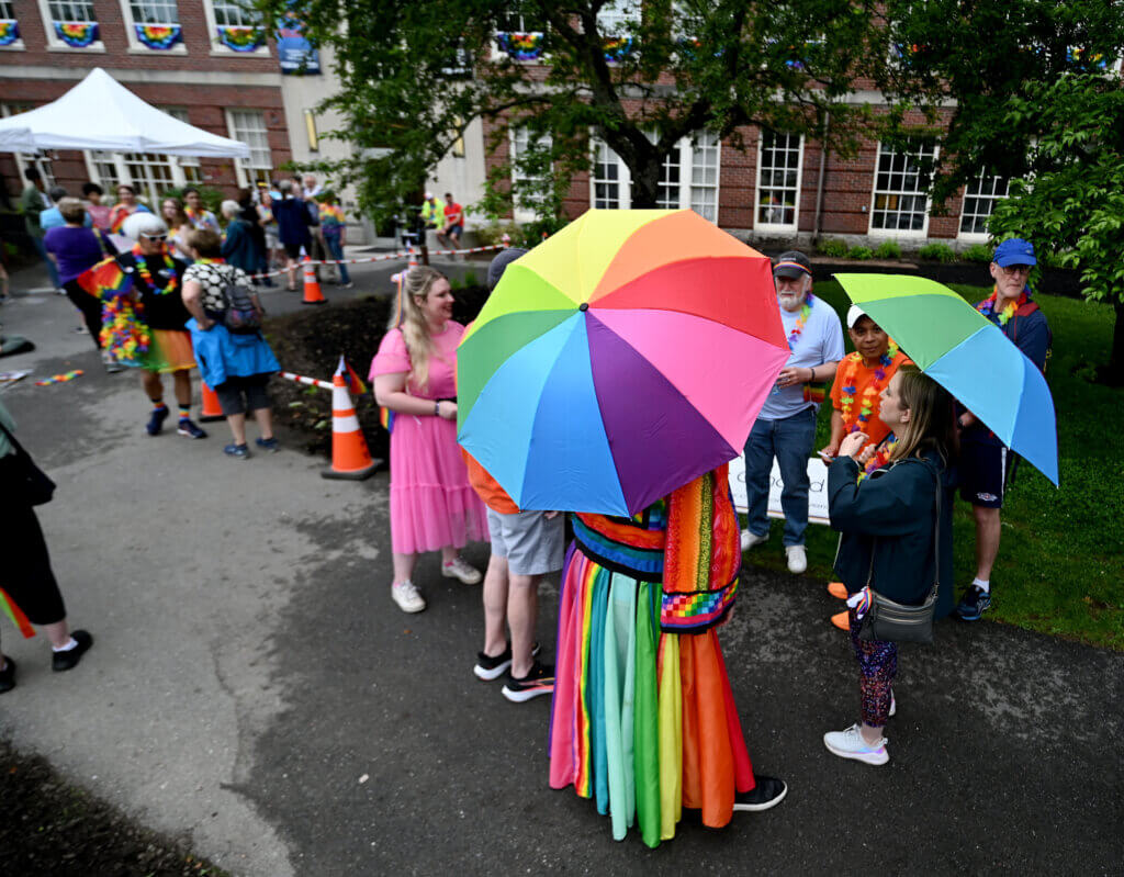 Parade participants line up at the Umbrella.
