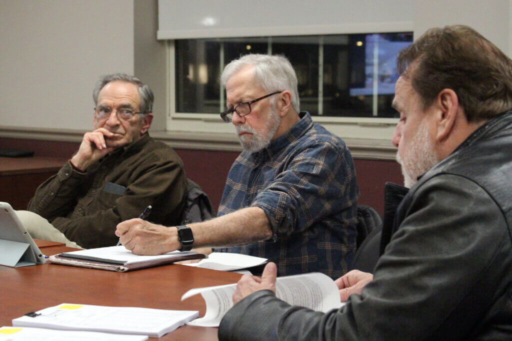 MIG Corp. CEO Don Voghel addresses the Natural Resources Commission while panelist Bill Kemeza takes notes. Photo: Dakota Antelman/The Acton Bridge