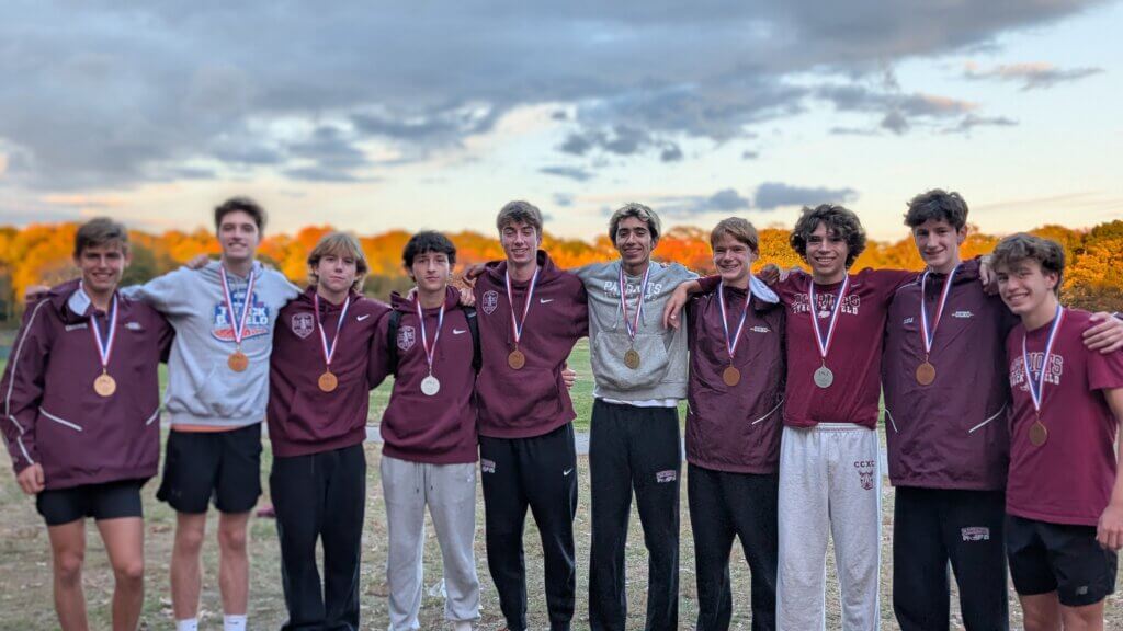 CCHS varsity and JV medalists at the Dual County League championship meet on October 24, from left: Luke Crounse, Ryan Perry, Joey Bodenrader, Charlie MacDonald, Isah Nichol, Sawyer Bout, Brendan Quinn, Toby Martel, Brady Quayle, and Jack Thomas. Photo by Adam Synnestvedt