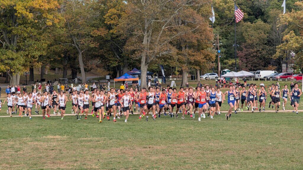 Runners jockey for position at the start of the Dual County League championship meet on October 24. Photo by Adam Synnestvedt