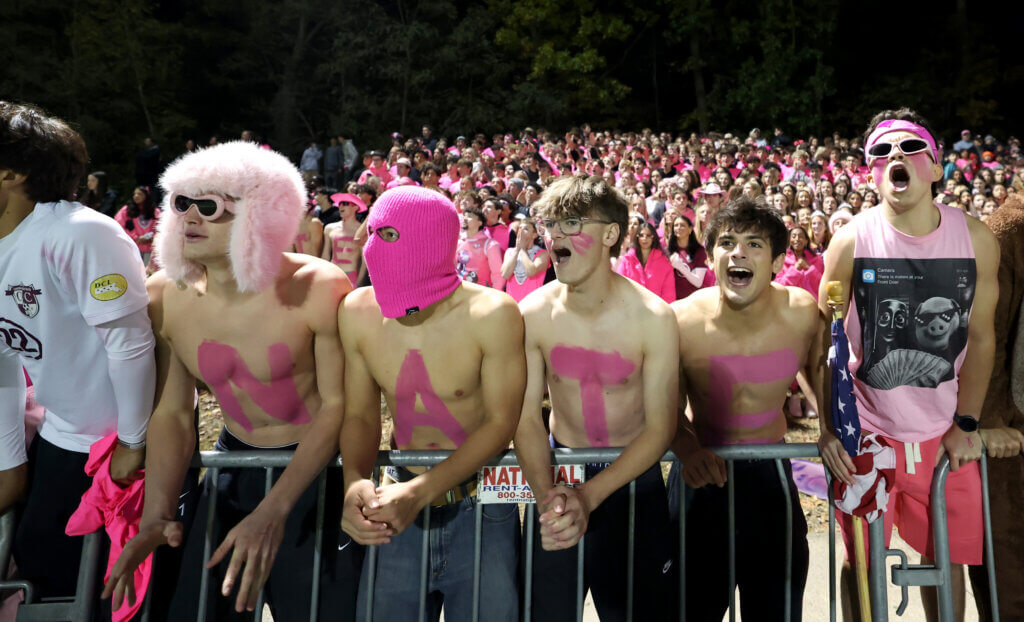 Pink letters spell out the name of Acton-Carlisle soccer player Nate Seeley on the chests of seniors (from left) Adler Kakas, Lukas Lundberg, Colin Gibson, and Kyle Amouzgar.