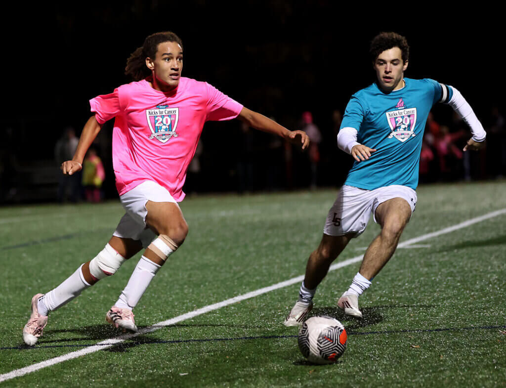 Acton-Carlisle’s Rory Best moves the ball toward the Lincoln-Sudbury net.