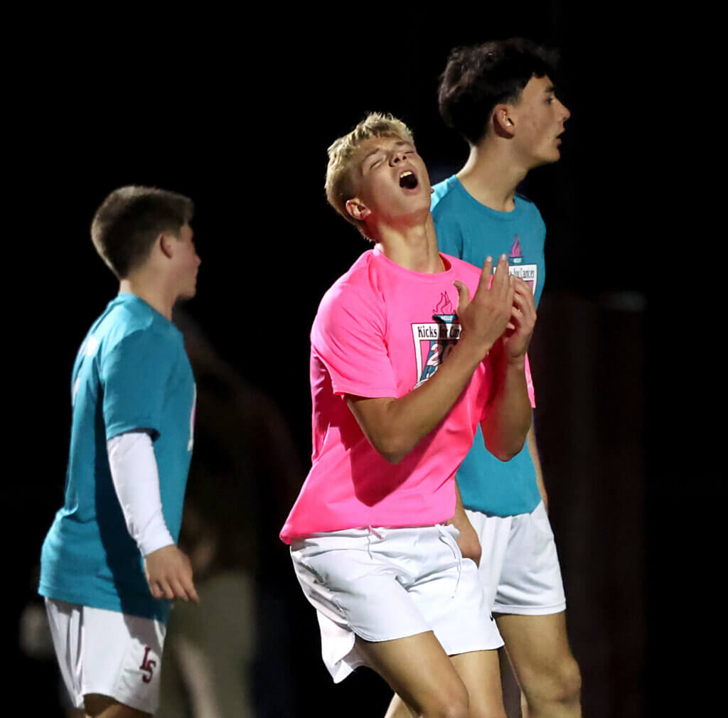 Burke Breimyer reacts to his near-goal as the Patriots’ second-half comeback bid falls short.