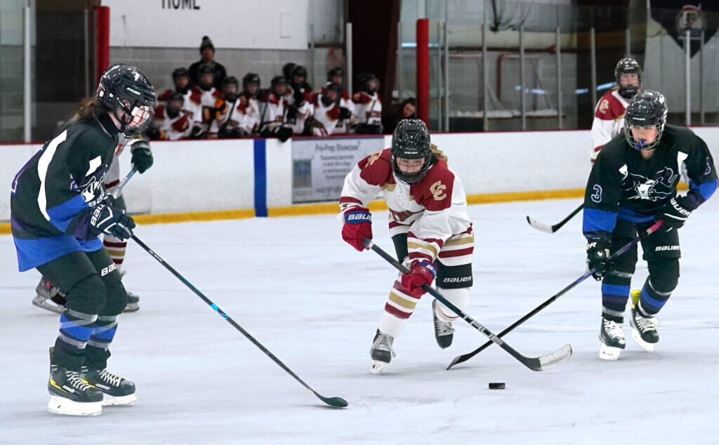 Samantha Sibley chases the puck. Photo by Justina Wu