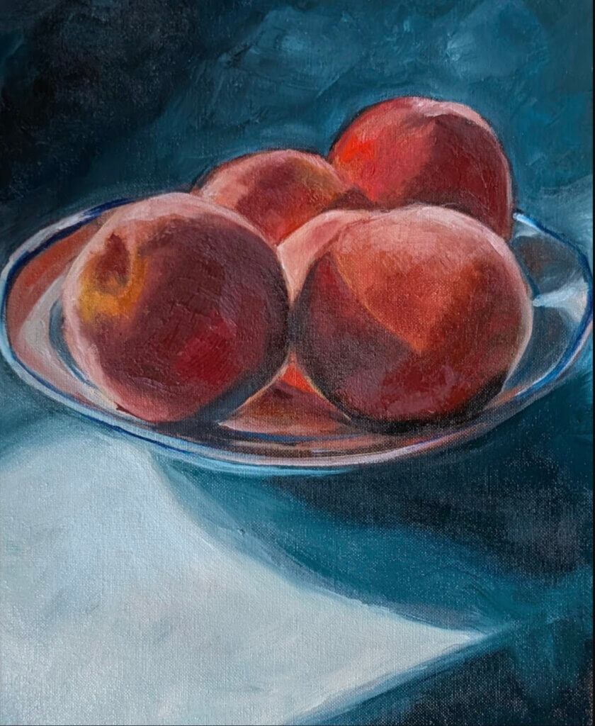 A still life of peaches where Zellmann-Rohrer was captivated by a small orange glow reflecting from one peach she described as the “mystery” within an otherwise ordinary scene. Courtesy photo