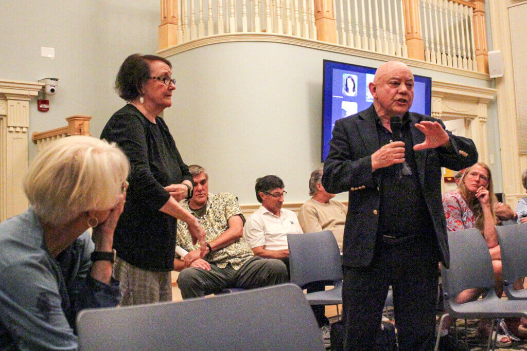 Acton resident John Williams, right, spoke against the town’s reporting proposal during a September 8 session. Photo: Dakota Antelman/The Acton Bridge