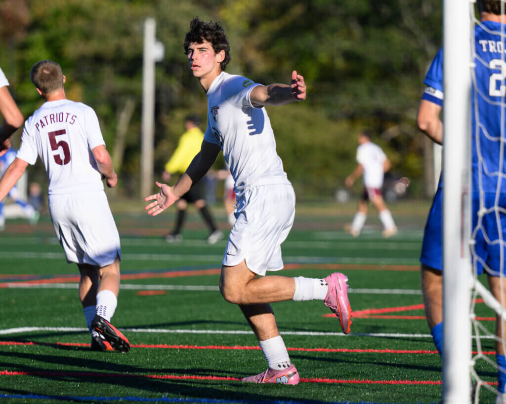 Matan Yosefson celebrates after scoring in the first half of Acton-Carlisle’s 2-0 win over Bromfield. Photo by Jon Straggas