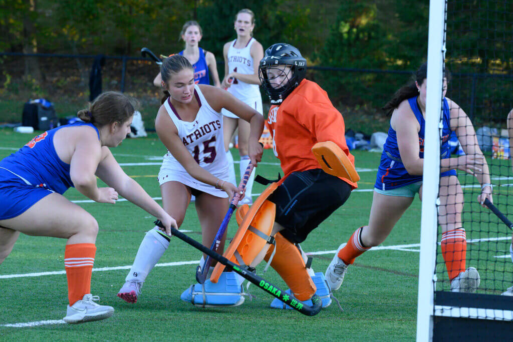 Skyla Rigazio beats the goalie to the corner of the net in the Patriots’ win over Newton South on October 7. 