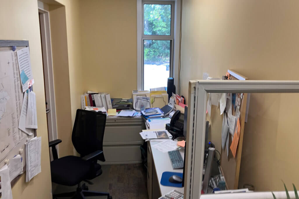 A hallway doubles as an office at the public works campus on Keyes Road. Photo: Dakota Antelman/The Acton Bridge