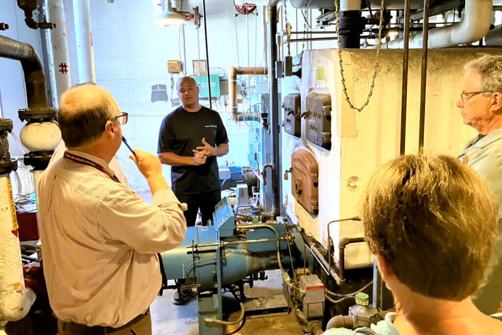 Land Use Working Group members listen to a presentation on aging boilers at Ripley Administrative Building. Photo: Dakota Antelman/The Acton Bridge
