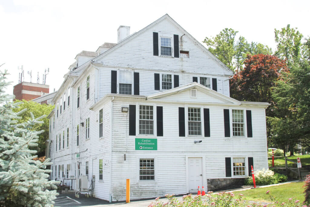 The historic “White House” was once a home for hospital nurses and has become a unique fixture of the hospital campus. Photo: Dakota Antelman/The Acton Bridge