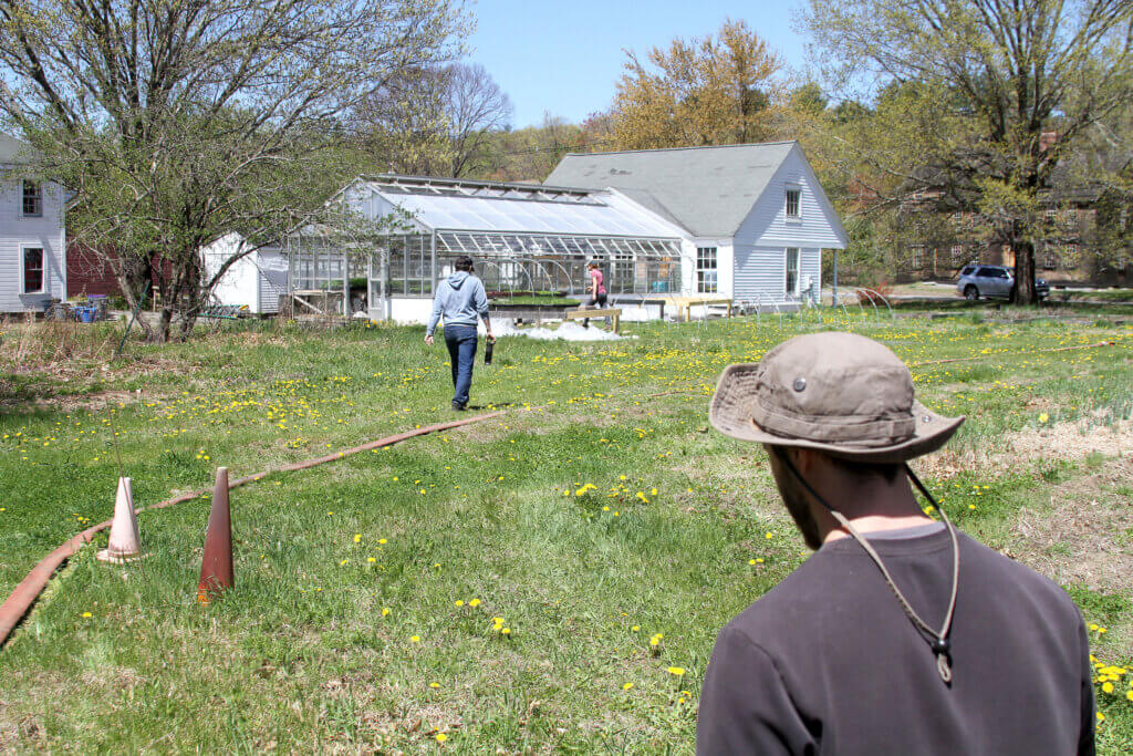 Barrett’s Mill Farm workers leave the fields for their lunch break. Photo: Dakota Antelman/The Acton Bridge
