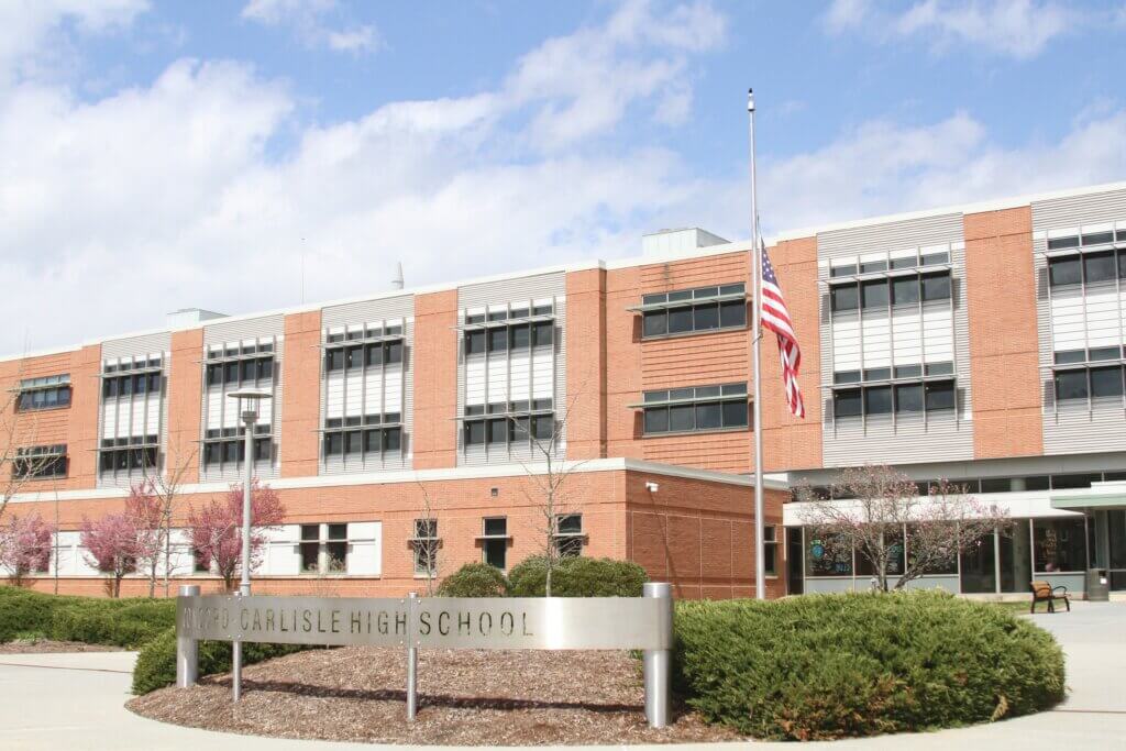 The flag outside CCHS flew at half-staff on Tuesday. Photo: Dakota Antelman/The Acton Bridge