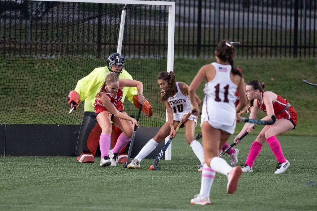 Sophia Arif attacks the Hawks' net, with co-captain Kaia Triola in support. Photo by David Clancy