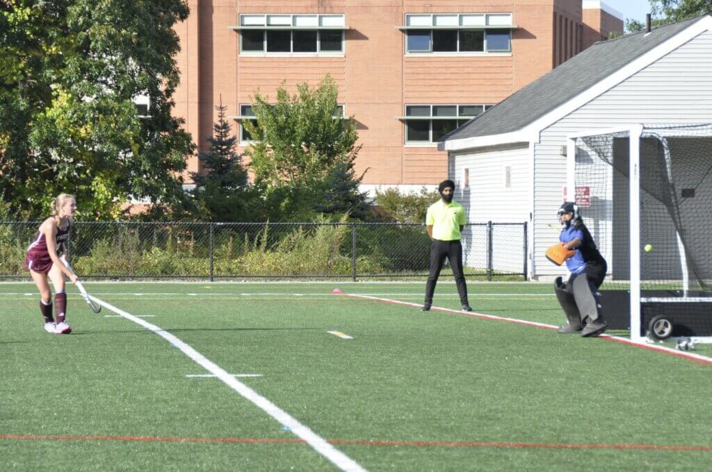 Abby Ruhmann capitalizes on a penalty stroke. Photo by David Clancy