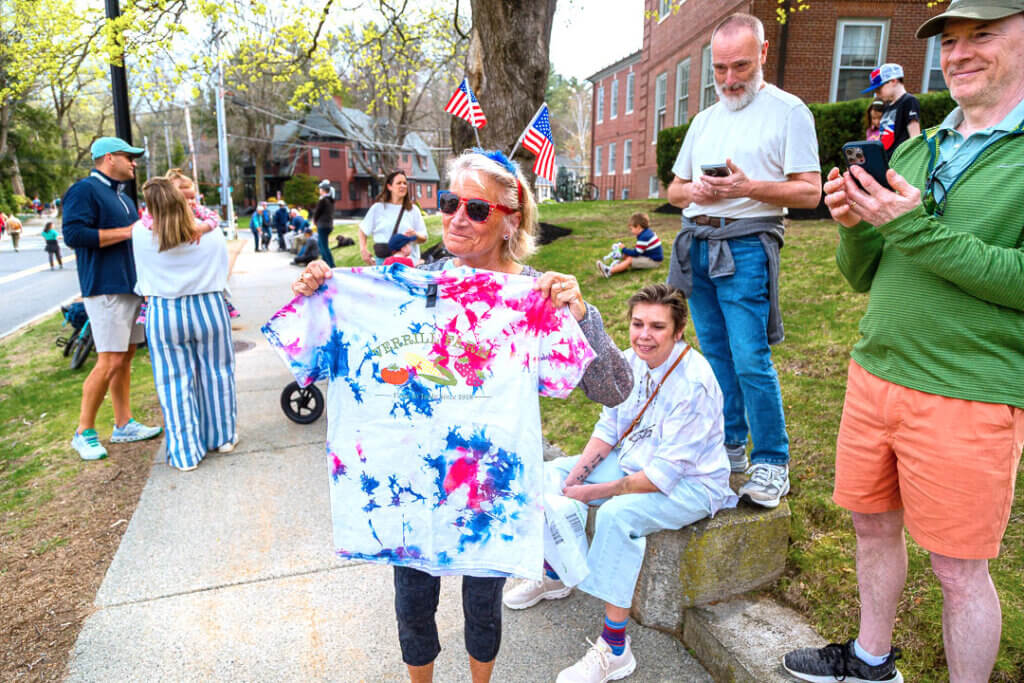 Kathleen Large shows off a tie-dyed shirt that she bought at Verrill Farm. Photo by Sarafina Zhang