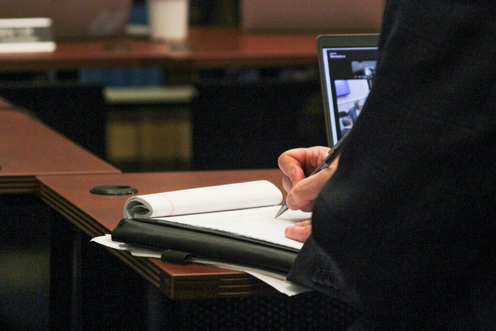 Interim Chief Financial Officer Ryan Ferrara takes notes during a Finance Committee meeting. Photo: Dakota Antelman/The Acton Bridge