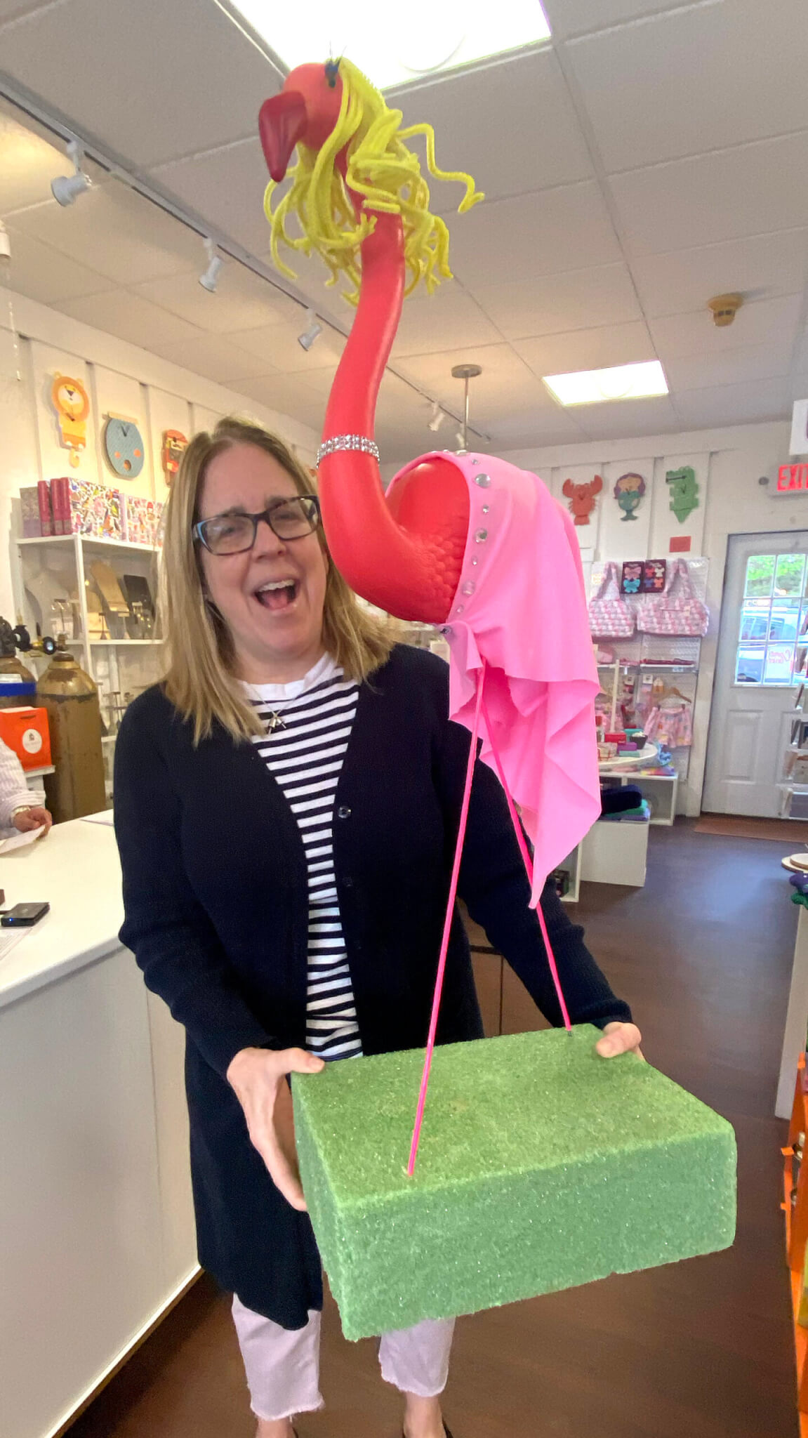 Jen McGonigle, owner of Joy Street Life + Home, welcomes Flamingo Barbie to her store. Courtesy photo