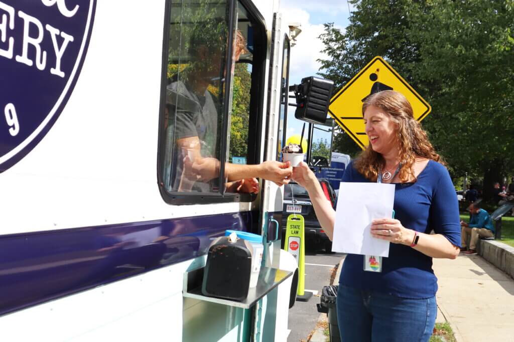 Library staff member Barbara Gugluizza came outside for a short break to get her eyes checked — and score some free ice cream — from the Westside Creamery truck. Photo: Trace Salzbrenner/The Acton Bridge