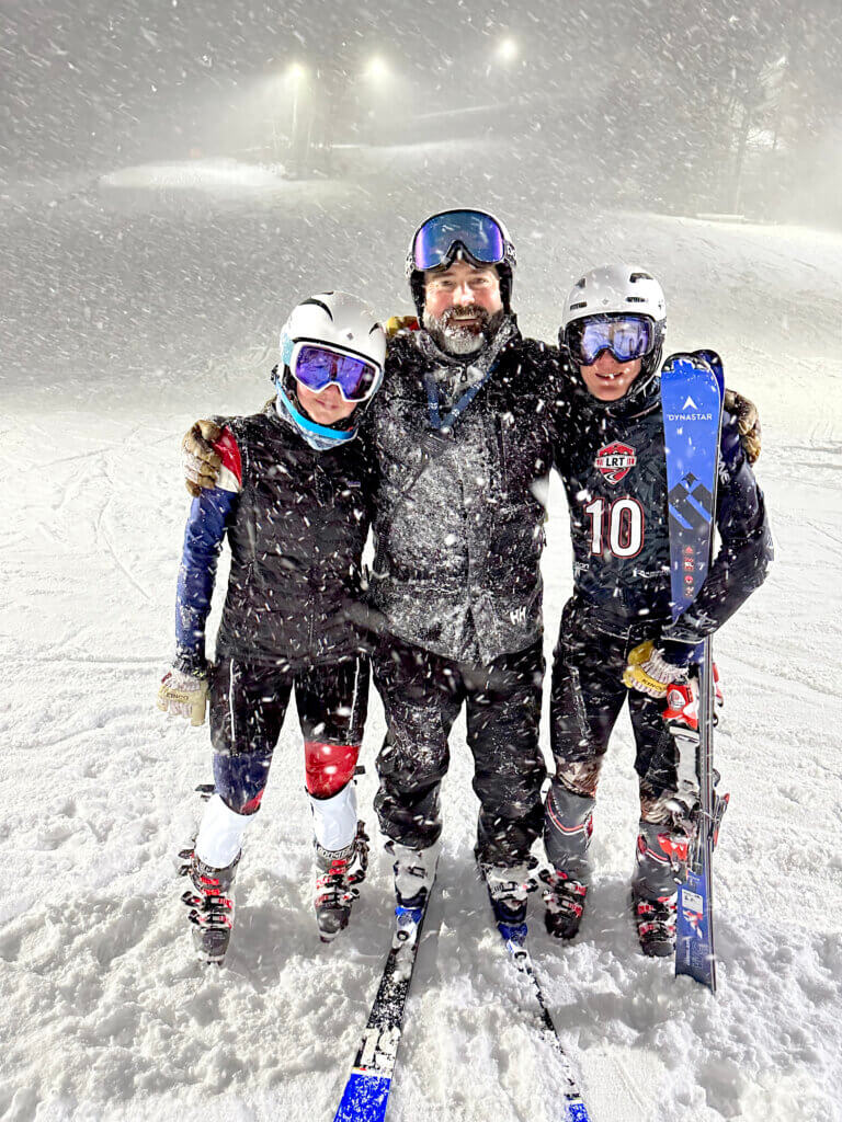 Juniper, Burton, and Henry Flint on a snowy training evening in Lincoln, New Hampshire. Photo courtesy of Jen Flint
