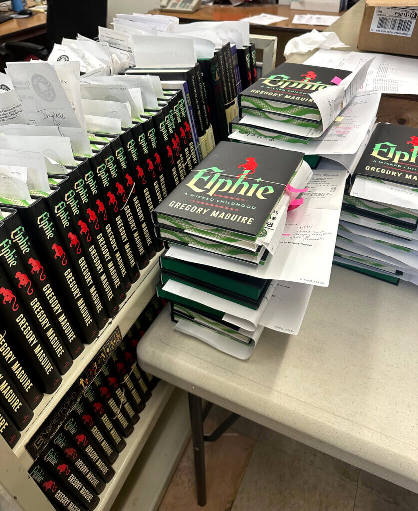 A book cart filled with copies of Maguire’s new book, “Elphie,” being prepared to ship all over the country. Photo courtesy of Dawn Rennert