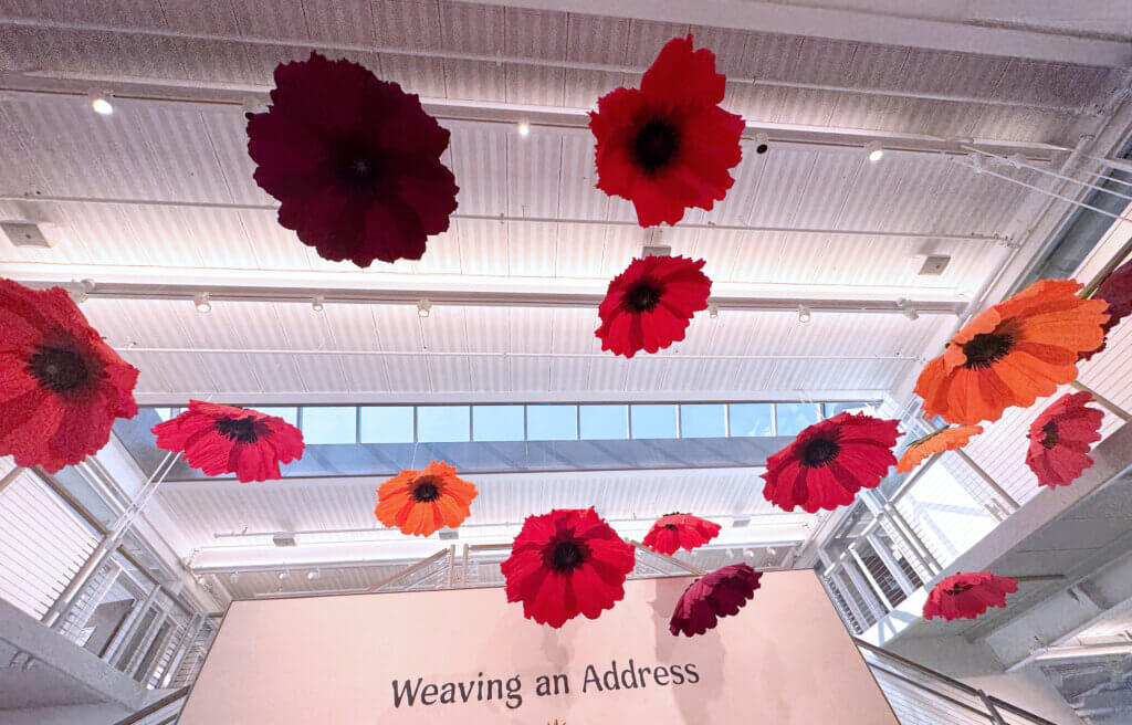 The red poppies remaining in the Umbrella Arts Center after a gala honoring Maguire. Photo by Gabriel Martins