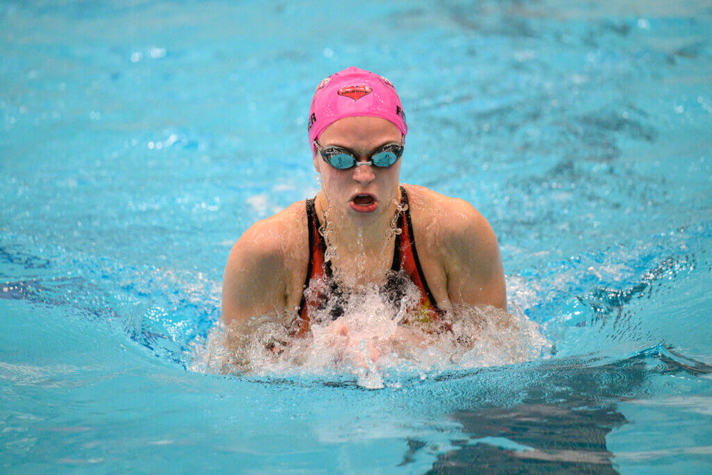 Sarah Fortier became the MIAA Division 1 champ in the 100-yard breaststroke for the second year in a row. Photo by Jon Straggas