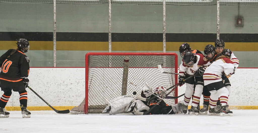 Acton-Carlisle’s Ava Thomas tallies her first goal of the season, scoring against Weston Wayland on January 21. Photo by Tina Wu