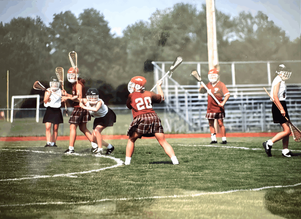 Emily Boynton Rush, No. 20, in 1995. Wooden sticks were almost phased out in favor of plastic, and the use of helmets was the subject of debate for more than a decade. Courtesy photo