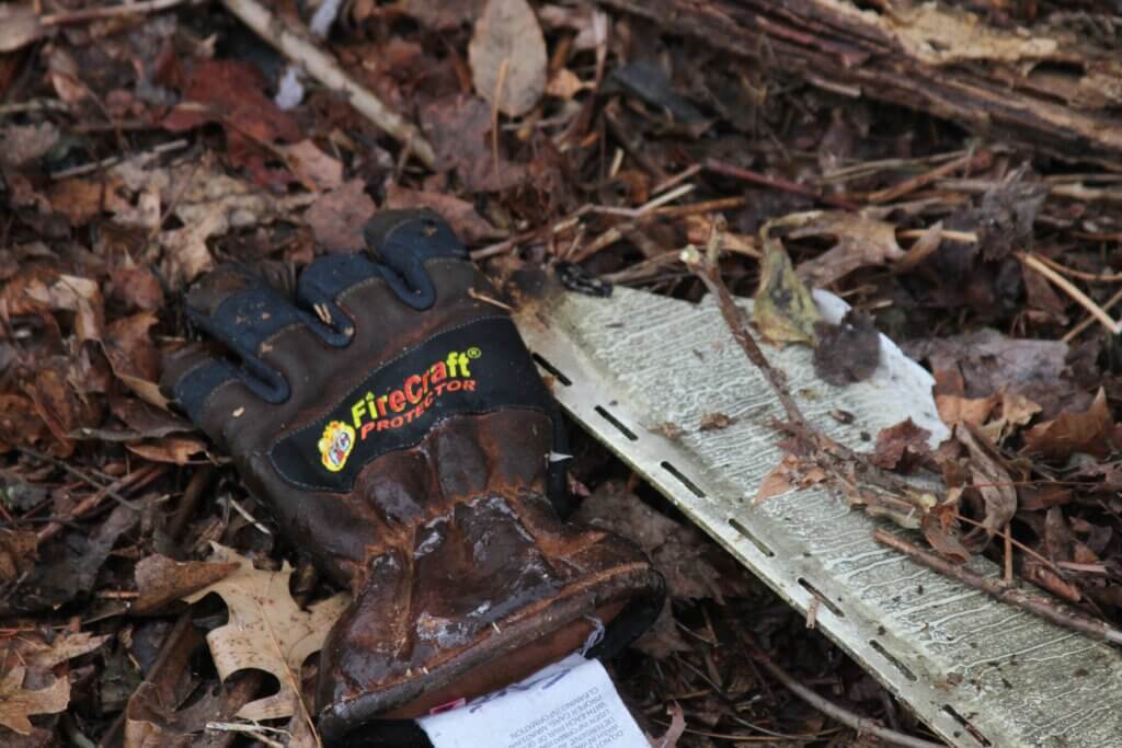 Pic 4: A firefighter’s glove lies on the ground next to the scene of a house fire on Cottage Lane. Photo: Dakota Antelman/The Acton Bridge