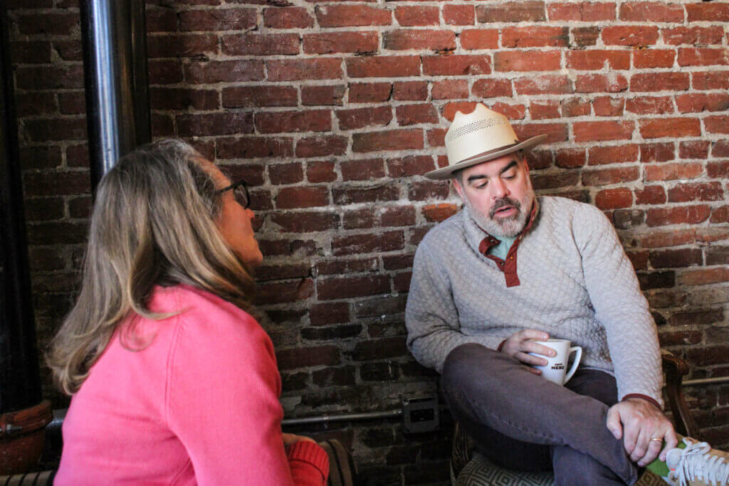 Select Board candidate Sam Hiersteiner, right, speaks with Public Works Commission Chair Andrea Solomon during a recent “coffee chat.” Photo: Dakota Antelman/The Acton Bridge