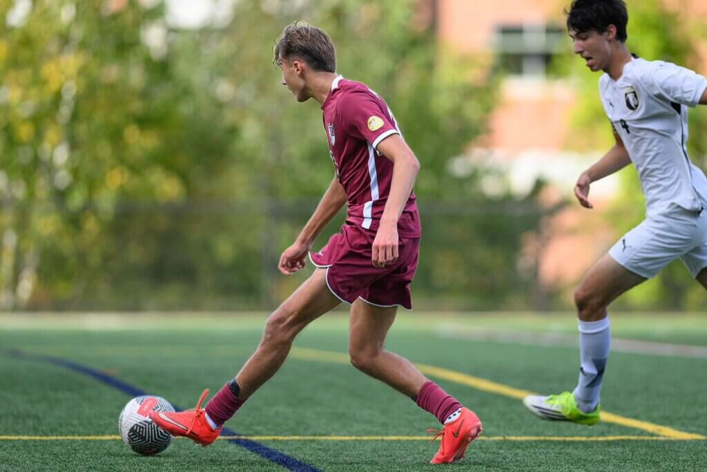 Co-captain Max Hepworth scores early in the first half against Cambridge Rindge & Latin on September 16. Photo by Jon Straggas