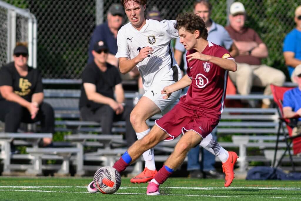 Owen Tompsett shoots on goal in the first half against Cambridge Rindge & Latin on September 16. Photo by Jon Straggas